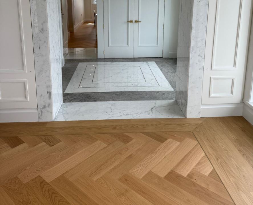 Residential tile and flooring installation in Vancouver home featuring kitchen and bathroom craftsmanship