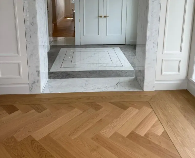Residential tile and flooring installation in Vancouver home featuring kitchen and bathroom craftsmanship